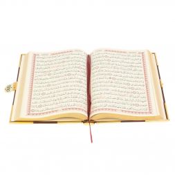 Коран на арабском языке в позолоченном окладе с четками